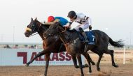 Brahms under jockey Alberto Sanna takes the lead in the feature. PICS: Juhaim/QREC