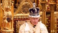 File: Britain's King Charles III, wearing the Imperial State Crown and the Robe of State, sits on The Sovereign's Throne in the House of Lords chamber, during the State Opening of Parliament, at the Houses of Parliament, in London, on November 7, 2023. (Photo by Leon Neal / POOL / AFP)