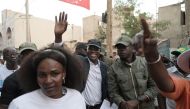 Senegalese presidential candidate Khalifa Sall greets supporters during a campaign meeting in Hann Bel-Air, Dakar, on February 19, 2024. (Photo by Seyllou / AFP)
