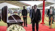 President of Kenya William Ruto approaches the coffin of Kelvin Kiptum while attending the funeral proceedings of the late marathon runner in Chepkorio on February 23, 2024. (Photo by LUIS TATO / AFP)
