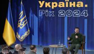 Ukraine's President Volodymyr Zelensky attends a press conference during the 