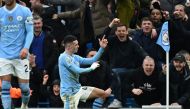 Manchester City's English midfielder #47 Phil Foden celebrates after scoring their second goal during the English Premier League football match between Manchester City and Manchester United at the Etihad Stadium in Manchester, north west England, on March 3, 2024. (Photo by Paul ELLIS / AFP)