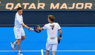 Argentina's Martin Di Nenno (left) and Franco Stupaczuk celebrate after defeating Inigo Jofre and Luis Hernandez Quesada of Spain, yesterday.