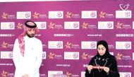 An official picks a team during the draw ceremony.