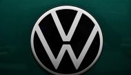 The logo of German car giant Volkswagen (VW) is pictured on a Volkswagen ID Buzz van during the company's annual press conference to present the business report, on March 14, 2023 in Berlin. Photo by John MACDOUGALL / AFP

