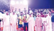 Minister of Environment and Climate Change H E Dr. Abdullah bin Abdulaziz bin Turki Al Subaie honouring winners of Ramadan Beach Volleyball Championship.