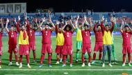Qatar players acknowledge the supporters after defeating Kuwait yesterday.