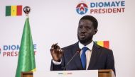 Senegalese opposition presidential candidate Bassirou Diomaye Faye addresses his first press conference after being declared winner of Senegal's presidential election, in Dakar, on March 25, 2024. (Photo by JOHN WESSELS / AFP)
