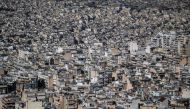 This aerial photograph taken on March 30, 2024 shows the buildings in Athens. (Photo by Aris MESSINIS / AFP)
