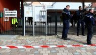 Gendarmes control the access to a school in the eastern France city of Souffelweyersheim while investigations are underway after two girls were wounded in a knife attack outside the school on April 18, 2024. (Photo by FREDERICK FLORIN / AFP)