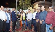 Officials present a memento to Gabriel Sharath (fourth left) during the event.