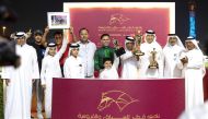 The connections of General Panic celebrate after the win. Al Uqda Complex Manager Abdulaziz Jassim Al Boenain and QREC Racing Manager Abdulla Rashid Al Kubaisi are also present. PIC: Juhaim/QREC 