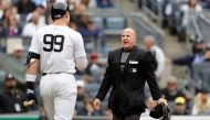Home plate umpire Ryan Blakney has words with Aaron Judge #99 of the New York Yankees after ejecting him in the seventh inning of a game against the Detroit Tigers at Yankee Stadium on May 04, 2024 in New York City. (Photo by Jim McIsaac / GETTY IMAGES NORTH AMERICA / Getty Images via AFP)
