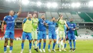 Al Shahania players celebrate after the win.