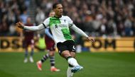 Liverpool's Dutch defender #04 Virgil van Dijk plays a pass during the English Premier League football match between West Ham United and Liverpool at the London Stadium, in London on April 27, 2024. (Photo by Ben Stansall / AFP)