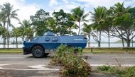 A Gendarmerie armored vehicle drives past the filtering roadblock set up on the bays, Promenade Pierre Vernier, in Noumea on May 15, 2024, amid protests linked to a debate on a constitutional bill aimed at enlarging the electorate for upcoming elections of the overseas French territory of New Caledonia. (Photo by Delphine Mayeur / AFP)

