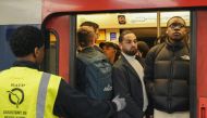 Commuters stand in a crowded train at Chateletes Halles RER station in Paris on May 21, 2024, during a strike called by SNCF employees, in which 1 in 5 trains is scheduled by the French railway company. Photo by Dimitar DILKOFF / AFP