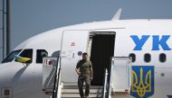Ukraine's President Volodymyr Zelensky gets off his plane upon his arrival at Figo Maduro military airport in Lisbon on May 28, 2024. (Photo by Patricia De Melo Moreira / AFP)
