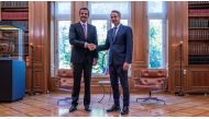 Amir H H Sheikh Tamim bin Hamad Al Thani and Prime Minister of the Hellenic Republic H E Kyriakos Mitsotakis in Athens yesterday.