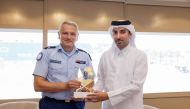Director of the Government Communications Office H E Sheikh Jassim bin Mansour bin Jabor Al Thani with the Head of the Information and Public Relations Service of the French National Gendarmerie, Jean-Valery Letterman, yesterday.  