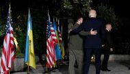 Ukrainian President Volodymyr Zelensky (left) and US President Joe Biden leave after signing a security agreement during a press conference at the Masseria San Domenico on the sidelines of the G7 Summit hosted by Italy in Apulia region, on June 13, 2024 in Savelletri. (Photo by Mandel Ngan / AFP)

