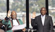 South Africa's Cyril Ramaphosa (R) gestures takes the oath of office for his second term as South African President at the Union Buildings in Pretoria on June 19, 2024. Photo by Kim LUDBROOK / POOL / AFP.