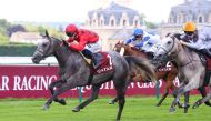 Mureb takes the lead as he races to win the Qatar Coupe de France des Chevaux Arabes yesterday.    