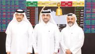 Acting CEO of Qatar Stock Exchange, Abdul Aziz Nasser Al Emadi, CEO and Co-founder of Techno Q, Abdulla Alansari change Venture Market, Managing Director and Co-founder of Techno Q, Zeyad Al Jaidah during the listing ceremony.