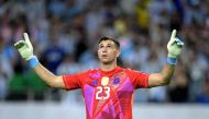 Argentina's goalkeeper #23 Emiliano Martinez celebrates after saving a goal during a penalty shoot out on July 4, 2024. (Photo by Juan Mabromata / AFP)