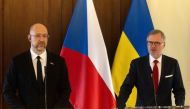Ukrainian Prime Minister Denys Shmyhal (L) and Czech Prime Minister Petr Fiala deliver a joint press conference following a meeting of the Czech and Ukrainian governments in Prague, Czech Republic on July 16, 2024. (Photo by MILAN KAMMERMAYER / AFP)
