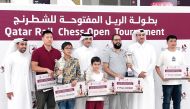 The podium winners pose for a photo with officials.