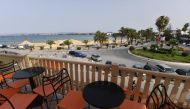 A general view of a beach as sand is spread to protect against rising sea levels and erosion, in the tourist town of Hammamet, about 65 kilometres southeast of Tunisia's capital on June 28, 2024. (Photo by Fethi Belaid / AFP)
