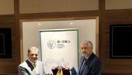 QC board member Mohamed bin Ahmed Al Obaidli with Director General of the Arab Bank for Economic Development in Africa Dr. Ould Tah.