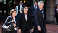Justina Sessions (L) and Eric Mahr (R), lawyers representing Google, leave the Albert V. Bryan US Courthouse during a break of a Department of Justice antitrust trial against Google over its advertiing business in Alexandria, Virginia, on September 9, 2024. Photo by SAMUEL CORUM / AFP.