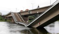 The partially collapsed Carola Bridge (Carolabruecke) on the Elbe river is pictured in the city centre of Dresden, Saxony, eastern Germany, on September 11, 2024. Photo by Odd ANDERSEN / AFP