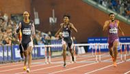 Qatar's Abderrahman Samba (right) finished second behind the  race winner Alison dos Santos of Brazil in the men's 400m hurdles event at the Brussels Diamond League Finals yesterday. AFP