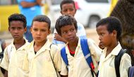 Photo used for demonstration purposes. School boys stand at the beginning of the new the academic year in Sudan's Red Sea State, at Wahda School west of Port Sudan, on September 16, 2024. Photo by AFP.