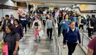 Commuters travel through the Centro Medico metro station in Mexico City, Mexico, on September 25, 2024. Photo by Rodrigo Oropeza / AFP