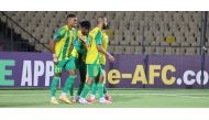 Al Wakrah’s Gelson Dala (centre) celebrates with teammates after scoring a goal against FC Ravshan yesterday.   