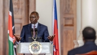 President of Kenya William Ruto delivers his remarks during a joint press conference with Prime Minister of Haiti Garry Conille (unseen) at the State House in Nairobi on October 11, 2024. (Photo by LUIS TATO / AFP)
