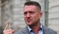 (FILES) Founder and former leader of the anti-Islam English Defence League (EDL), Stephen Yaxley-Lennon, also known as Tommy Robinson, arrives at Westminster Magistrates Court in central London on April 22, 2024, following his arrest at a march against antisemitism in November last year. (Photo by Adrian DENNIS / AFP)