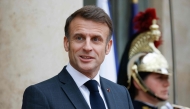 French President Emmanuel Macron looks on as he attends Kazakhstan's president arriving at the Elysee presidential palace prior to a meeting with French president as part of his state visit to France in Paris, on November 5, 2024. (Photo by Ludovic Marin / AFP)