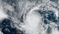 This National Oceanic and Atmospheric Administration (NOAA)/GOES satellite handout image shows Tropical Storm Beryl at 19:30UTC on June 29, 2024. (Photo by Handout / NOAA/GOES / AFP)

