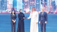 Minister of Communications and Information Technology H E Mohammed bin Ali Al Mannai (second right) and other officials at the award ceremony. 