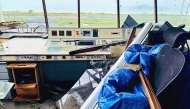 This handout photograph taken and released by the General Direction of the civil aviation on December 14, 2024 shows damage in the control tower at the airport in Pamandzi, hours after Cyclone Chido batterred the French Indian Ocean island of Mayotte with winds of up to 220 kilometres (137 miles) per hour. (Photo by Handout / DGAC / AFP)