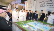 Minister of Transport H E Sheikh Mohammed bin Abdulla bin Mohammed Al Thani with other officials at the event.