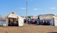 File: Sudanese people who fled escalating violence in the al-Jazira state are pictured at a camp for the displaced in the eastern city of Gedaref on November 23, 2024. (Photo by AFP)

