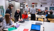 Students attend a class on media literacy at the Hiidenkiven Koulu school on November 19, 2024 in Helsinki, Finland. (Photo by Jonathan Nackstrand / AFP)