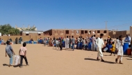 Photo for representational purposes only. People queue for water in Omdurman, the Sudanese capital's twin city, during battles between the Sudanese military forces and paramilitary Rapid Support Forces (RSF), on January 17, 2025. (Photo by AFP)
