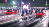 Competitors wait for the start of a race during the final eliminations of the third round.